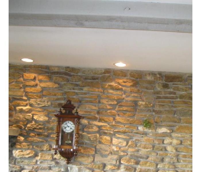 Photo of the stone fireplace wall after cleaning